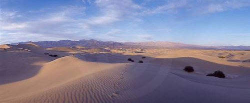 Scenic sand dunes panoramic during early sunset, Death Valley, California