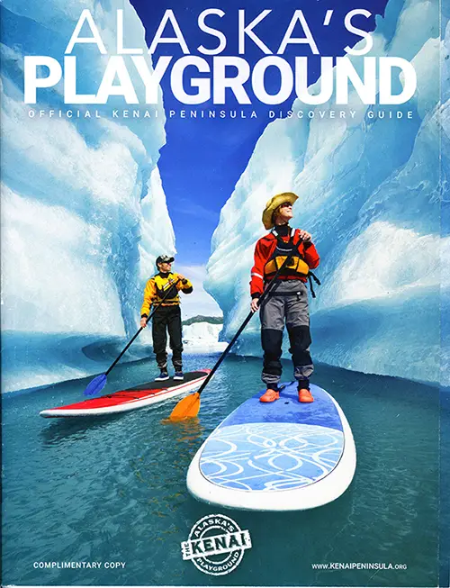 Alaska Tourism Magazine, Stand Up Paddler’s on the water in between icebergs at Bear Glacier, Kenai Peninusla